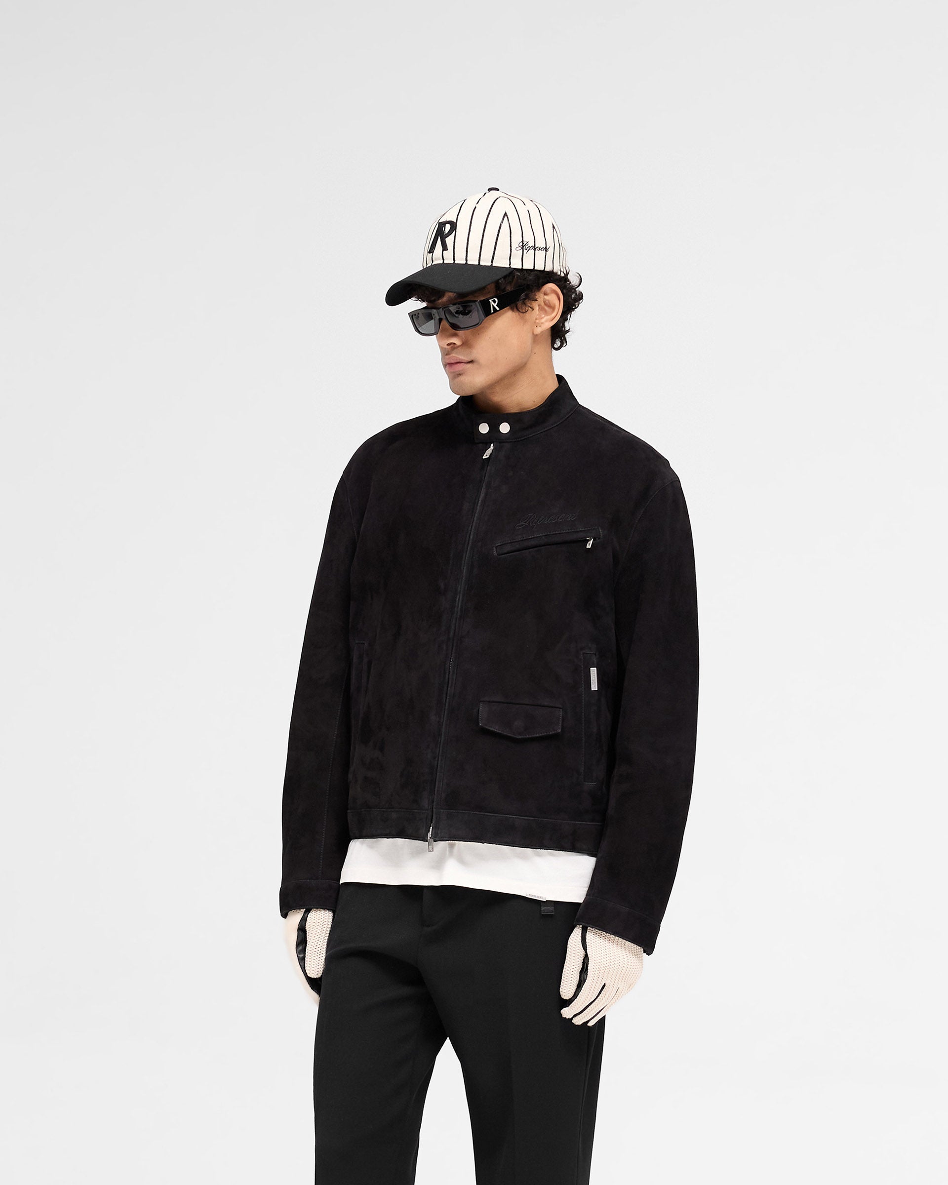 Back product image of a mens black suede jacket on a plain white background | Overdrive Suede Jacket in Jet Black | Suede jacket with vented shoulder seams and biker neck collar | SS25 Outerwear | Represent Clo