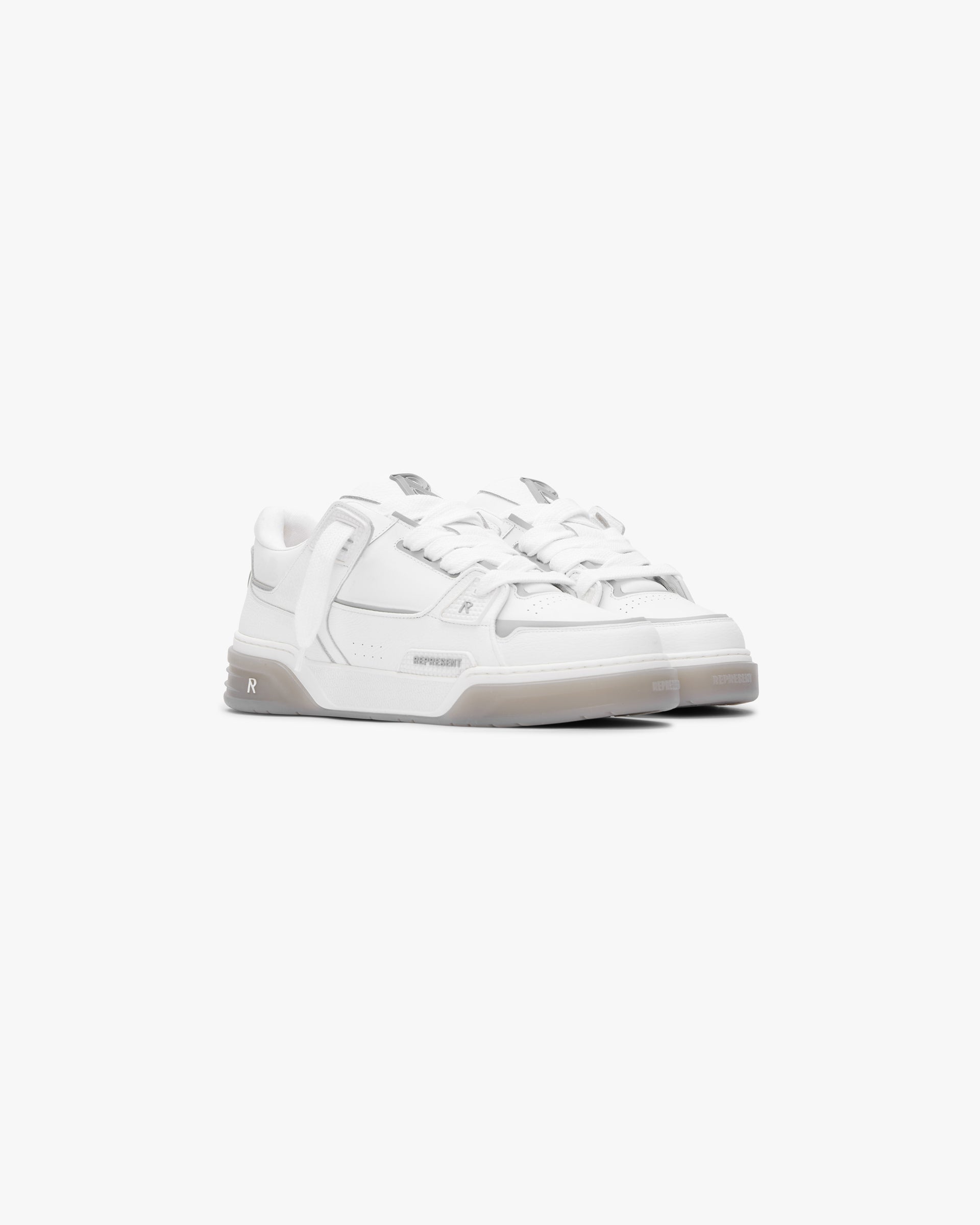 Back product image of a mens white and grey sneaker on a plain white background | Studio Sneaker in White Grey | Leather sneaker with branded TPU trims and tri-color twin cupsole | SS24 Footwear | Represent Clo