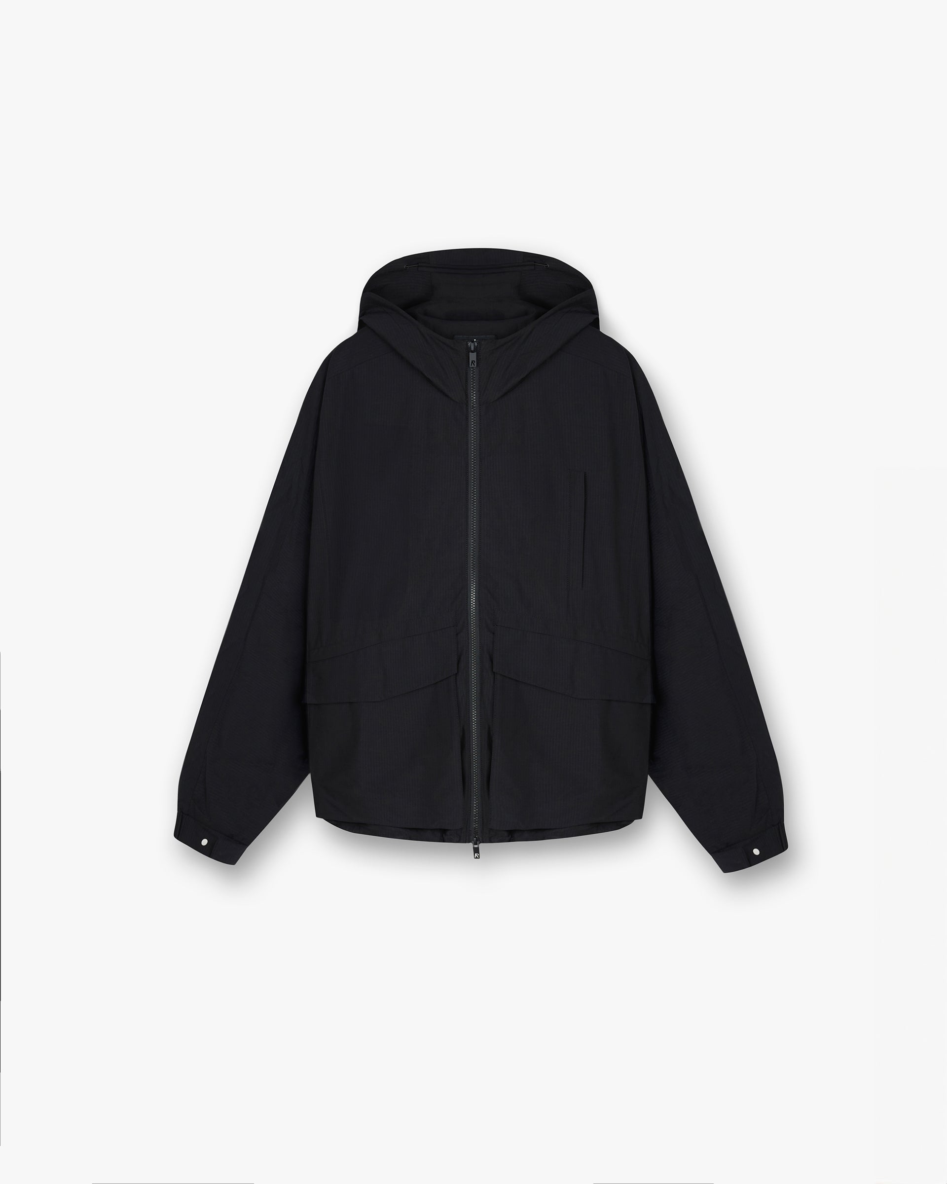 Front product image of a mens black jacket on a plain white background | Tech Cargo Jacket in Jet Black | Luxury outerwear with applique embroidery | FW24 Outerwear | Represent Clo