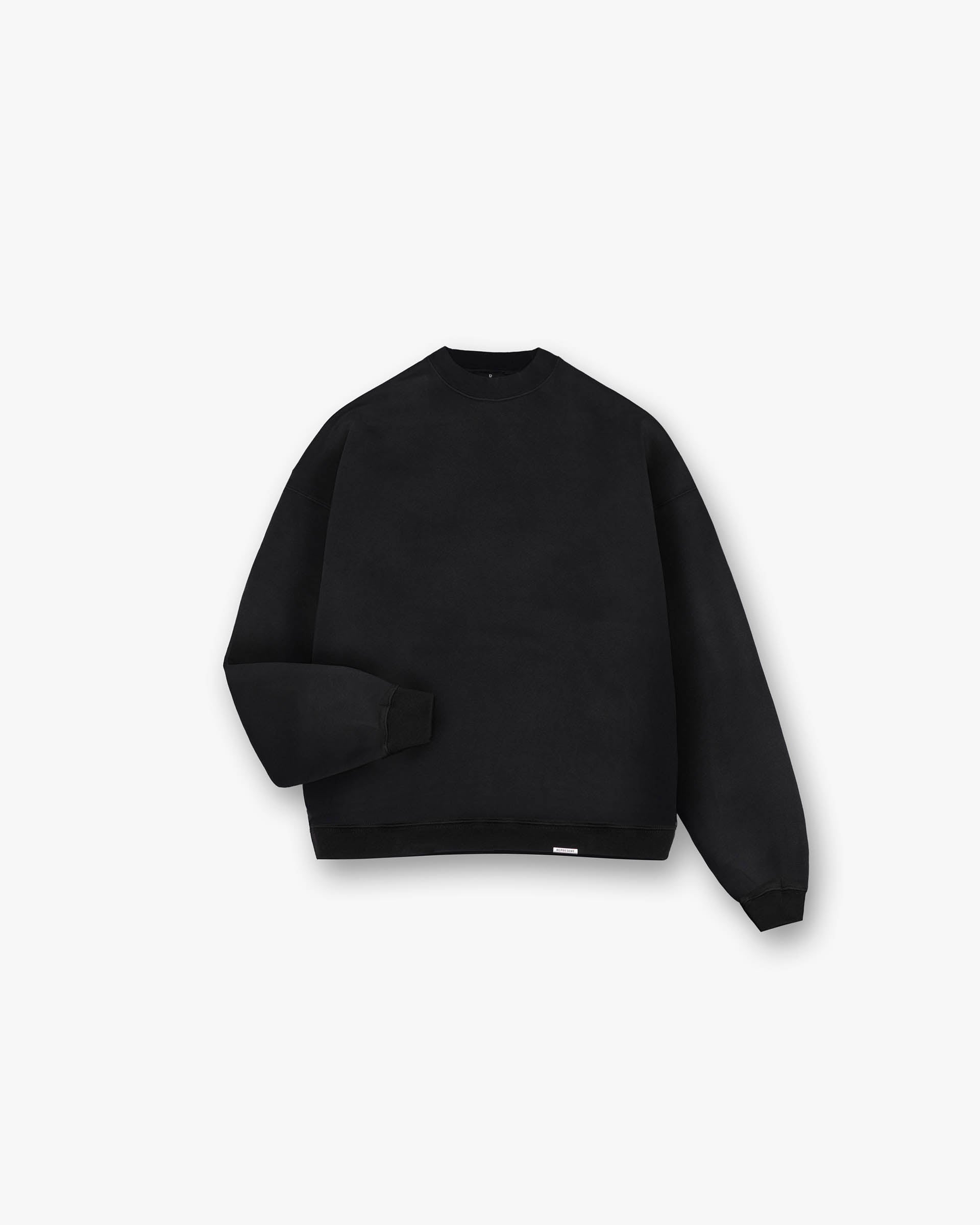 Front product image of a mens black boxy sweater on a plain white background | Initial Boxy Sweater in Black | Boxy fit sweater with embroidered Initial logo | Initial Sweaters | Represent Clo