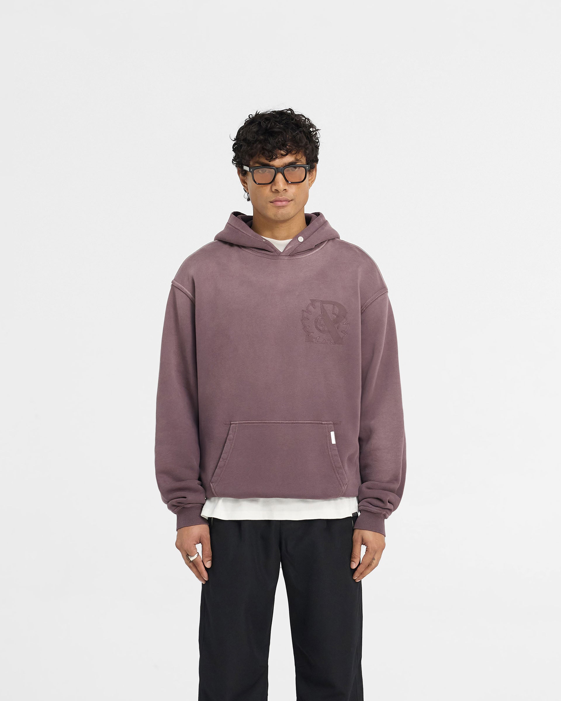 Man wearing a purple hoodie on a plain white background | Represent X Belstaff Outline Phoenix Hoodie in Plum | Oversized heavyweight hoodie | Exclusives Hoodies | Represent Clo