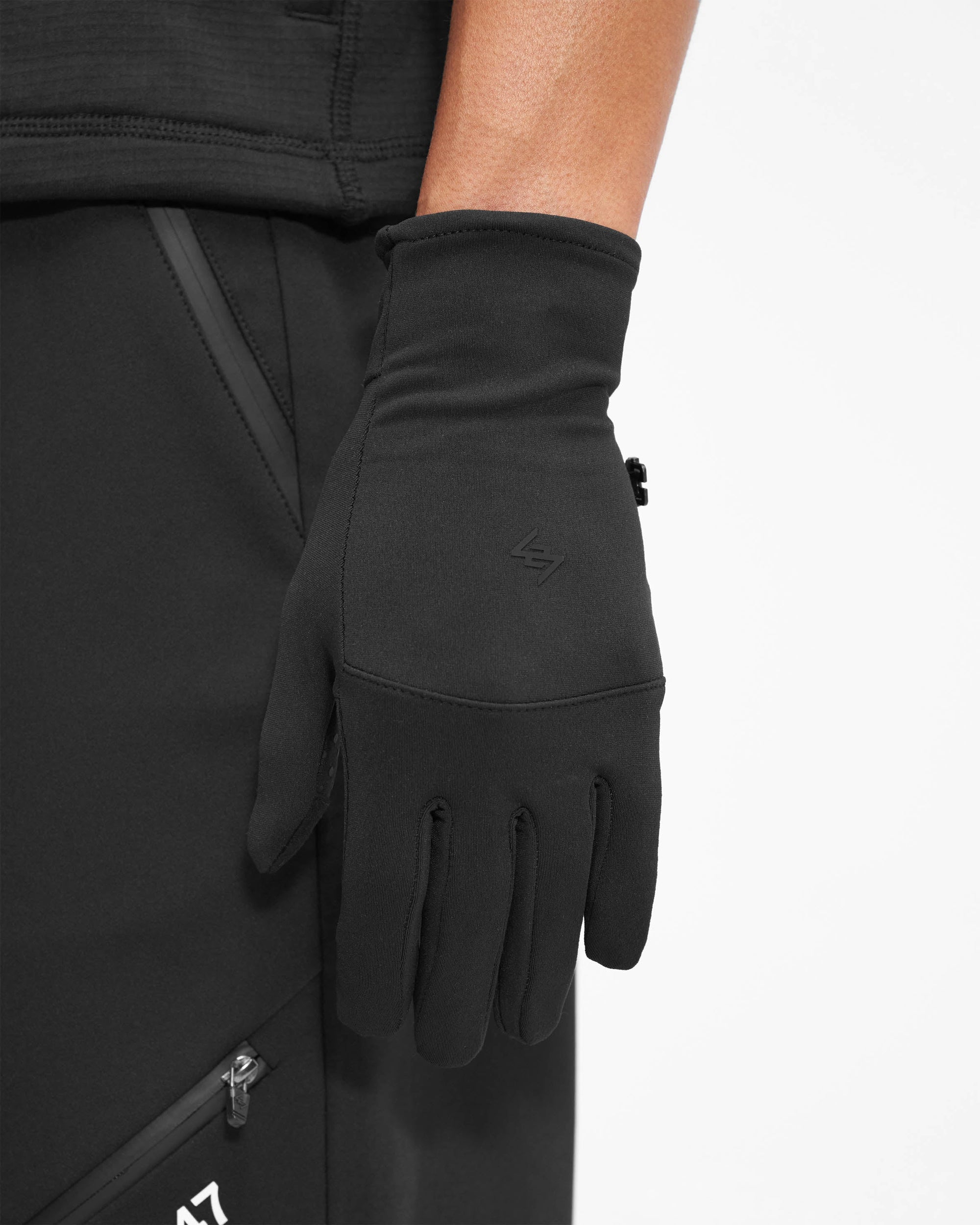 Back product image of mens black gloves on a plain white background | 247 Gloves in Black | Technical gloves with touchscreen capability and dot grips | 247 Accessories | Represent Clo