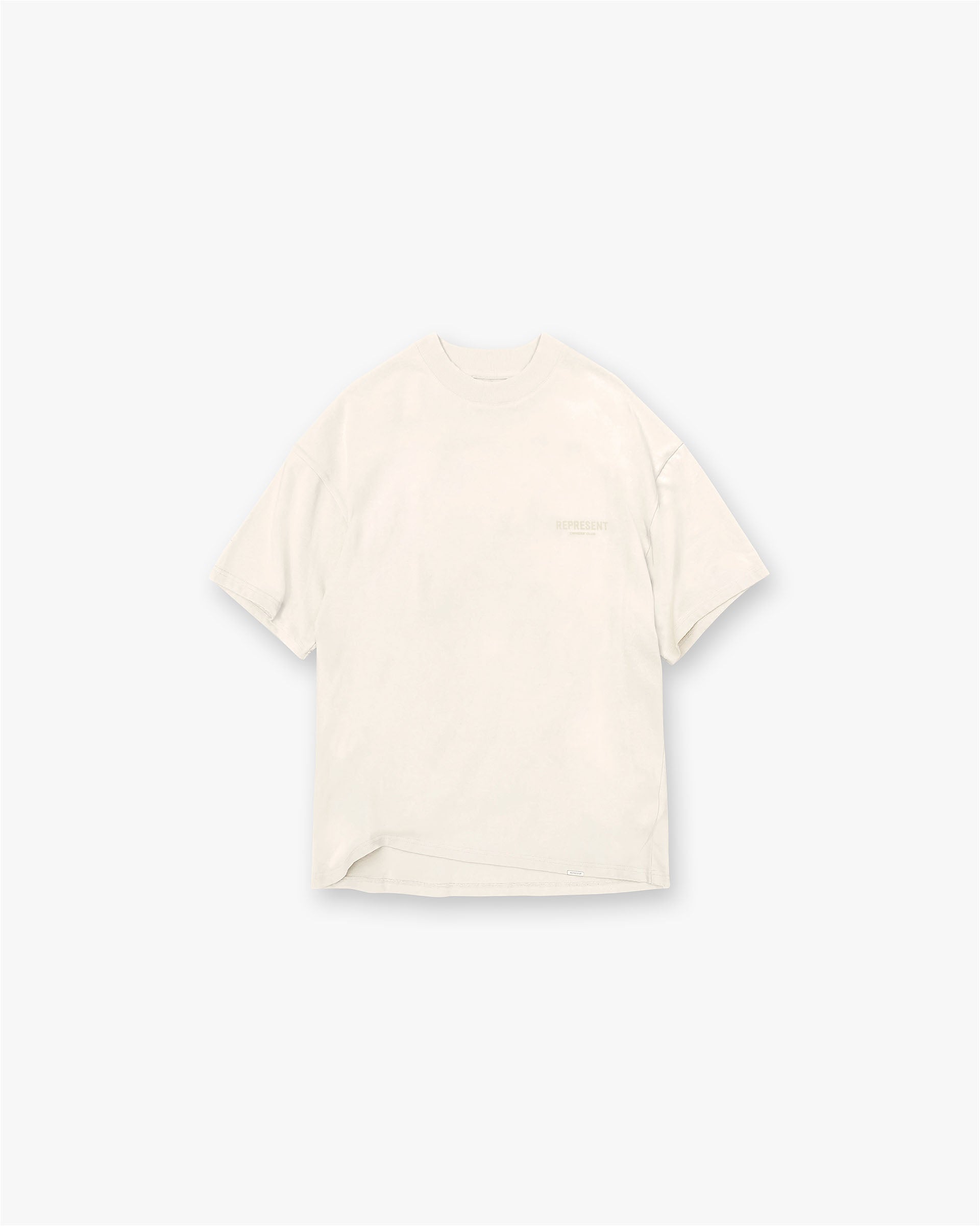 Back product image of a mens buttercream t-shirt on a plain white background | Represent Owners Club T-Shirt in Buttercream | Oversized fit t-shirt with round neck | Owners Club T-Shirts | Represent Clo