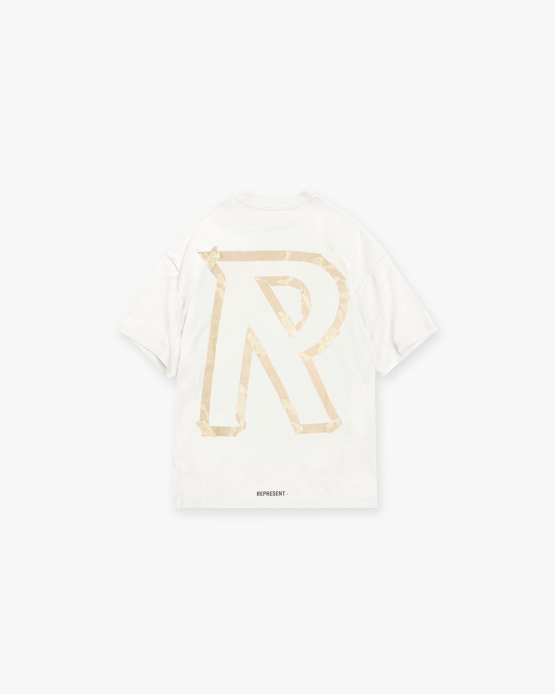 Back product image of a mens white t-shirt on a plain white background | Masking Tape Initial T-Shirt in Flat White | Slightly oversized t-shirt with 3D masking tape effect | FW24 T-Shirts | Represent Clo