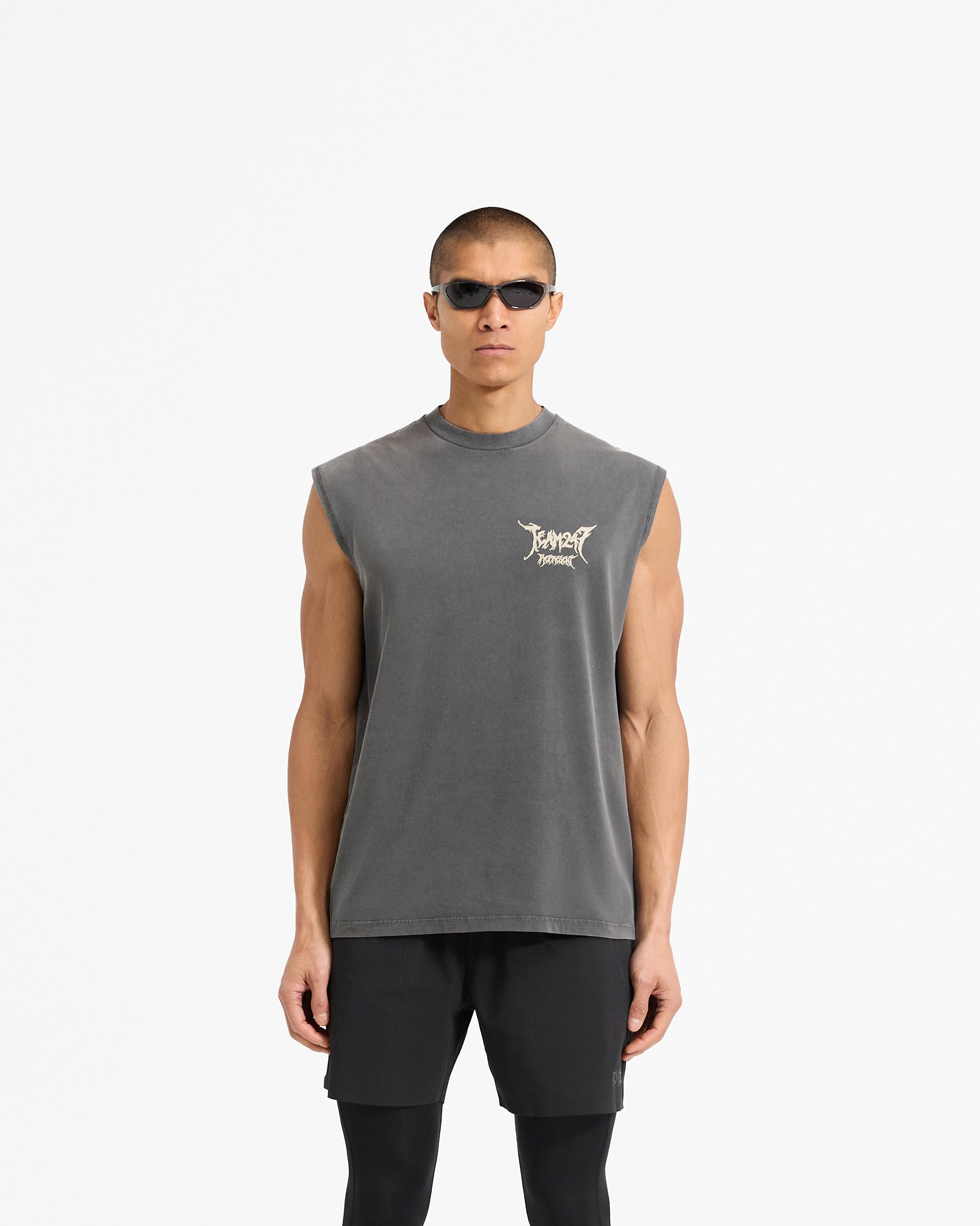 Man wearing a washed grey tank on a plain white background | Team 247 X END Oversized Tank in Washed Grey | Oversized tank with co-branded graphics | 247 T-Shirts | Represent Clo