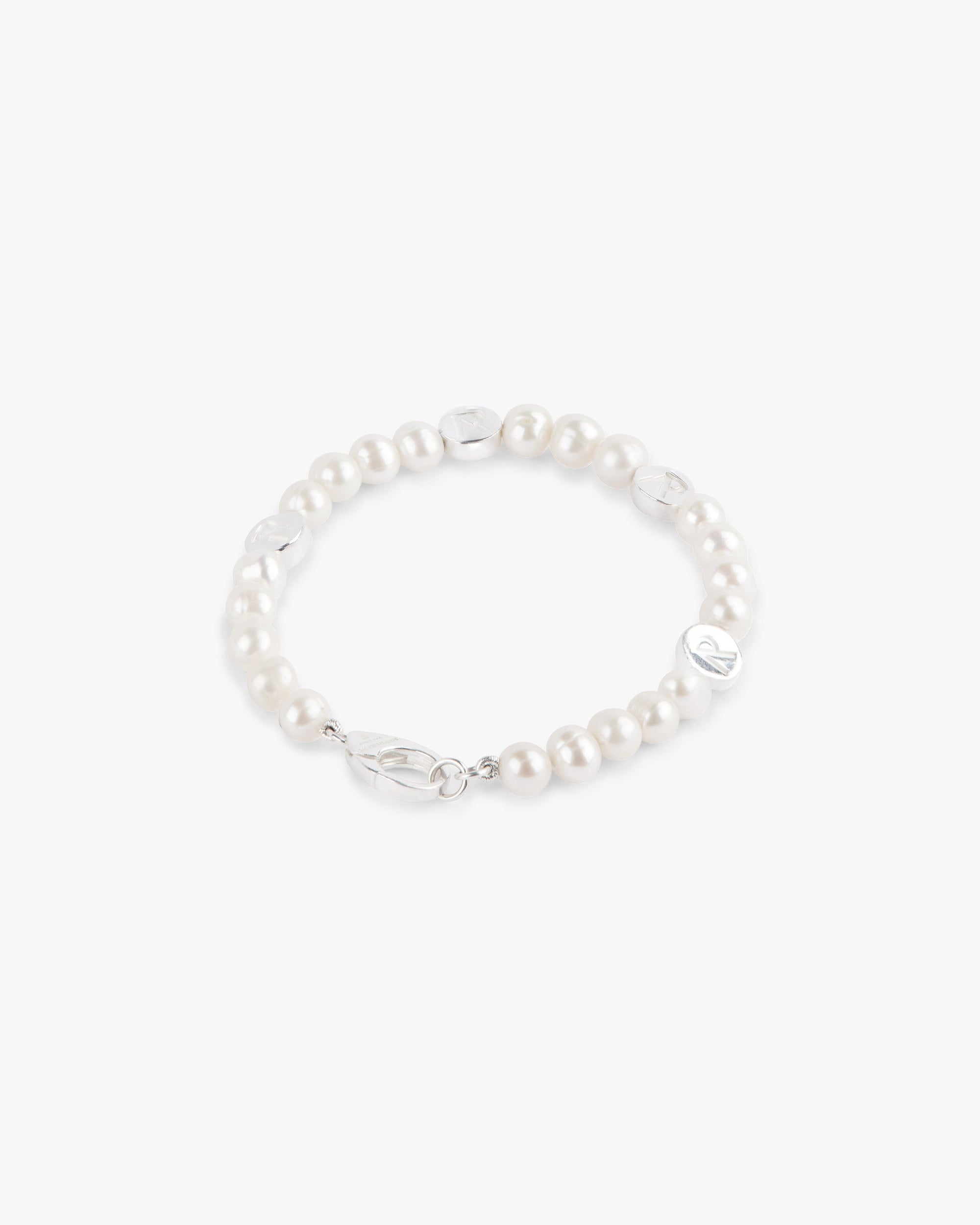 Front product image of a mens silver pearl bracelet on a plain white background | Represent Pearl Bracelet in Silver | Pearl bracelet with luxury design | FW23 Accessories | Represent Clo