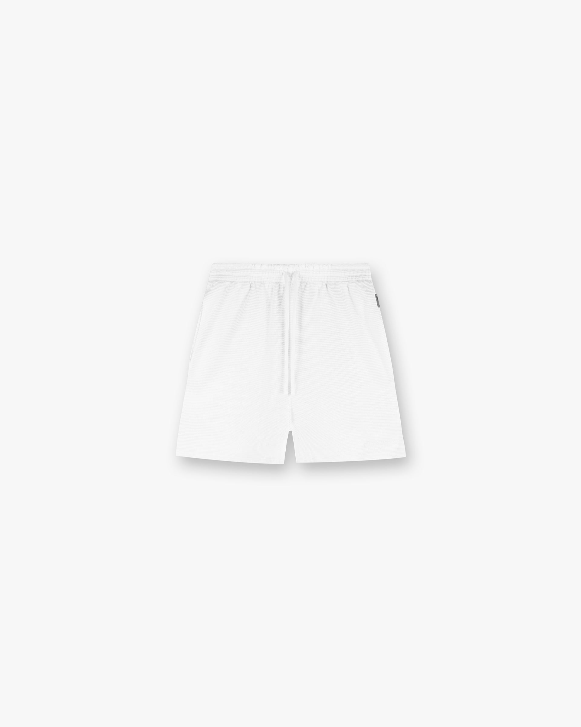 Front product image of mens white shorts on a plain white background | Waffle Shorts in White | Textured waffle knit shorts with elasticated waistband | SS25 Shorts | Represent Clo
