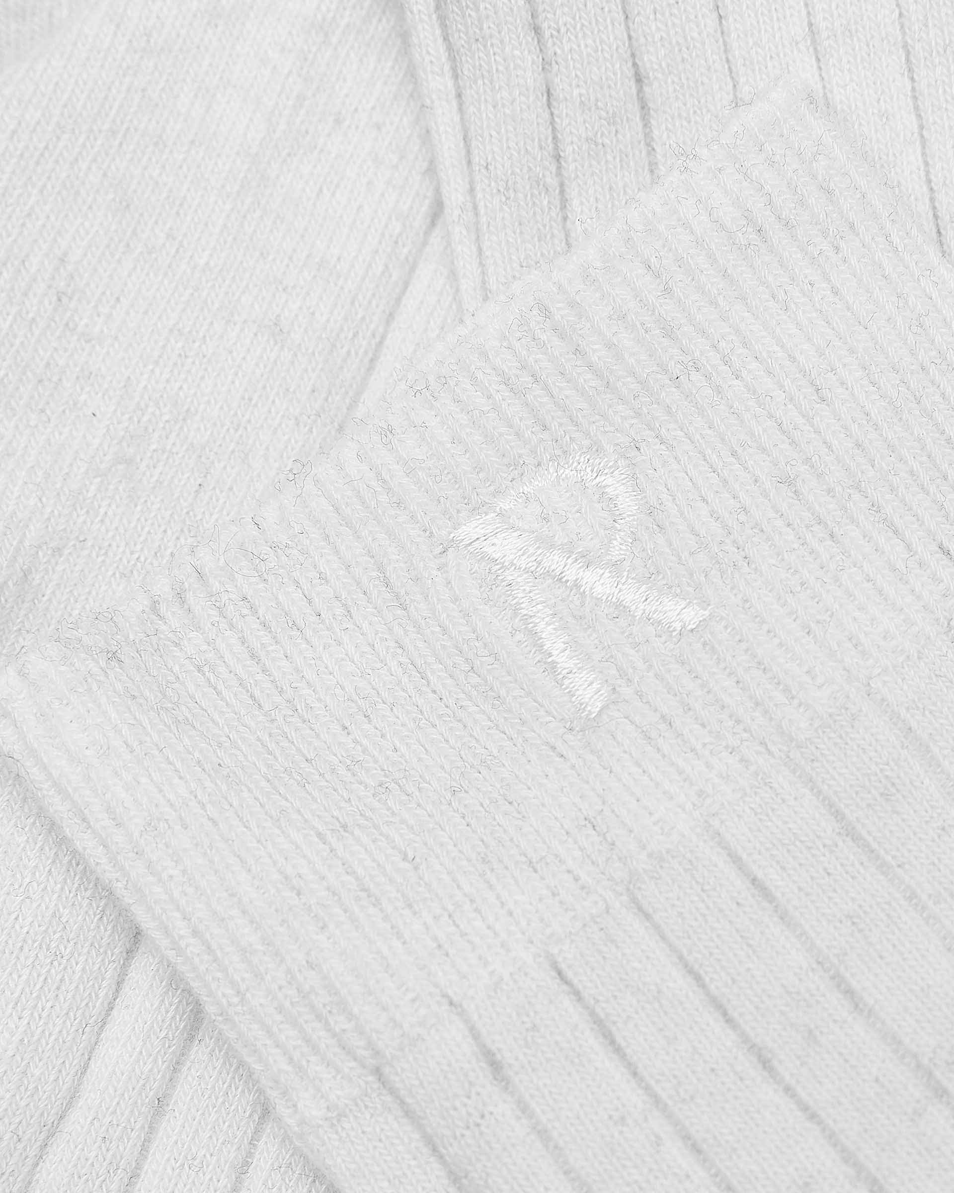 Back product image of a mens white sock on a plain white background | Initial Socks in Flat White | Ribbed cotton socks with embroidered Initial | SS23 Accessories | Represent Clo