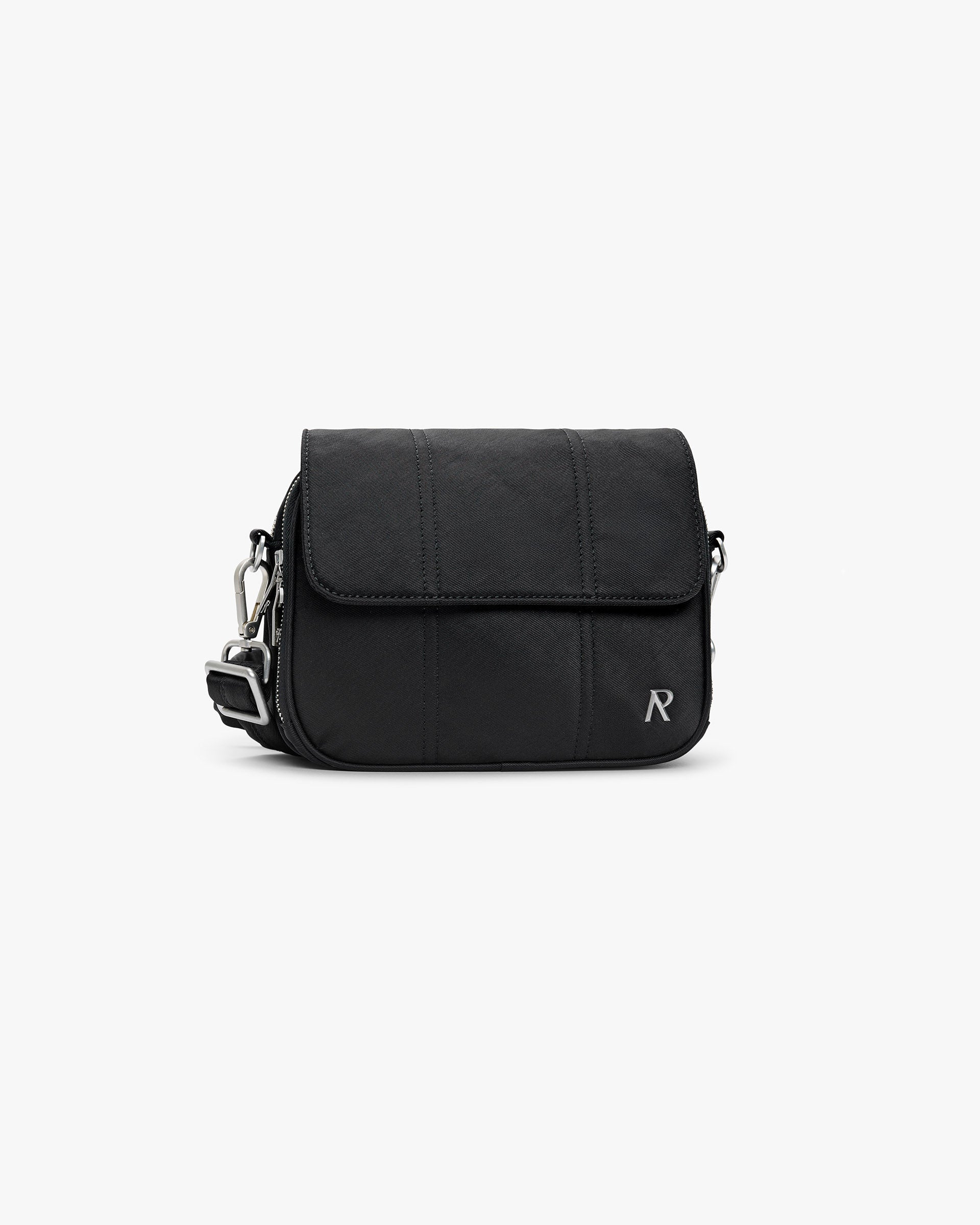 Front product image of a mens black crossbody bag on a plain white background | Quilted Crossbody Bag in Jet Black | Quilted polyester accessory | SS25 Accessories | Represent Clo