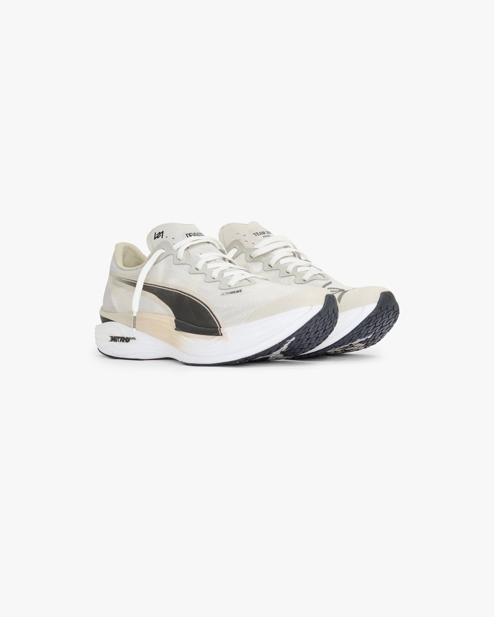 Back product image of a mens beige running shoe on a plain white background | 247 X Puma Deviate Nitro 3 Elite Men's in Desert Dust | High traction outsole with PWRPLATE technology | 247 Footwear | Represent Clo