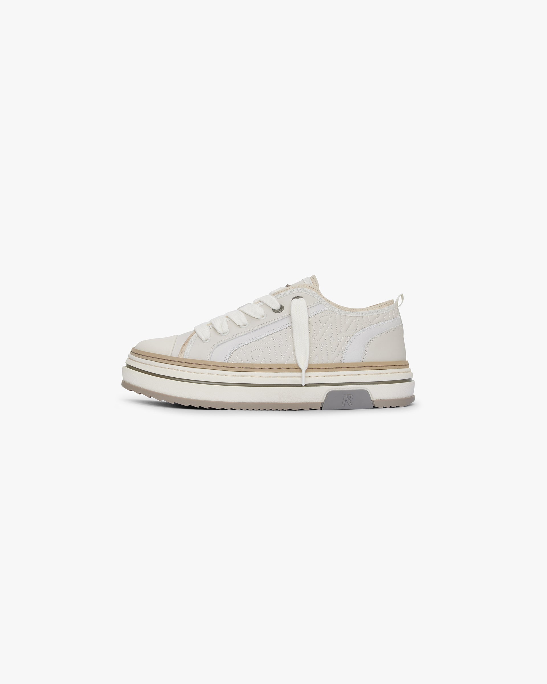 Mens white leather sneaker on a plain white background | HTN X Low in Vintage White | Luxury leather sneaker with embroidered detailing | SS24 Footwear | Represent Clo