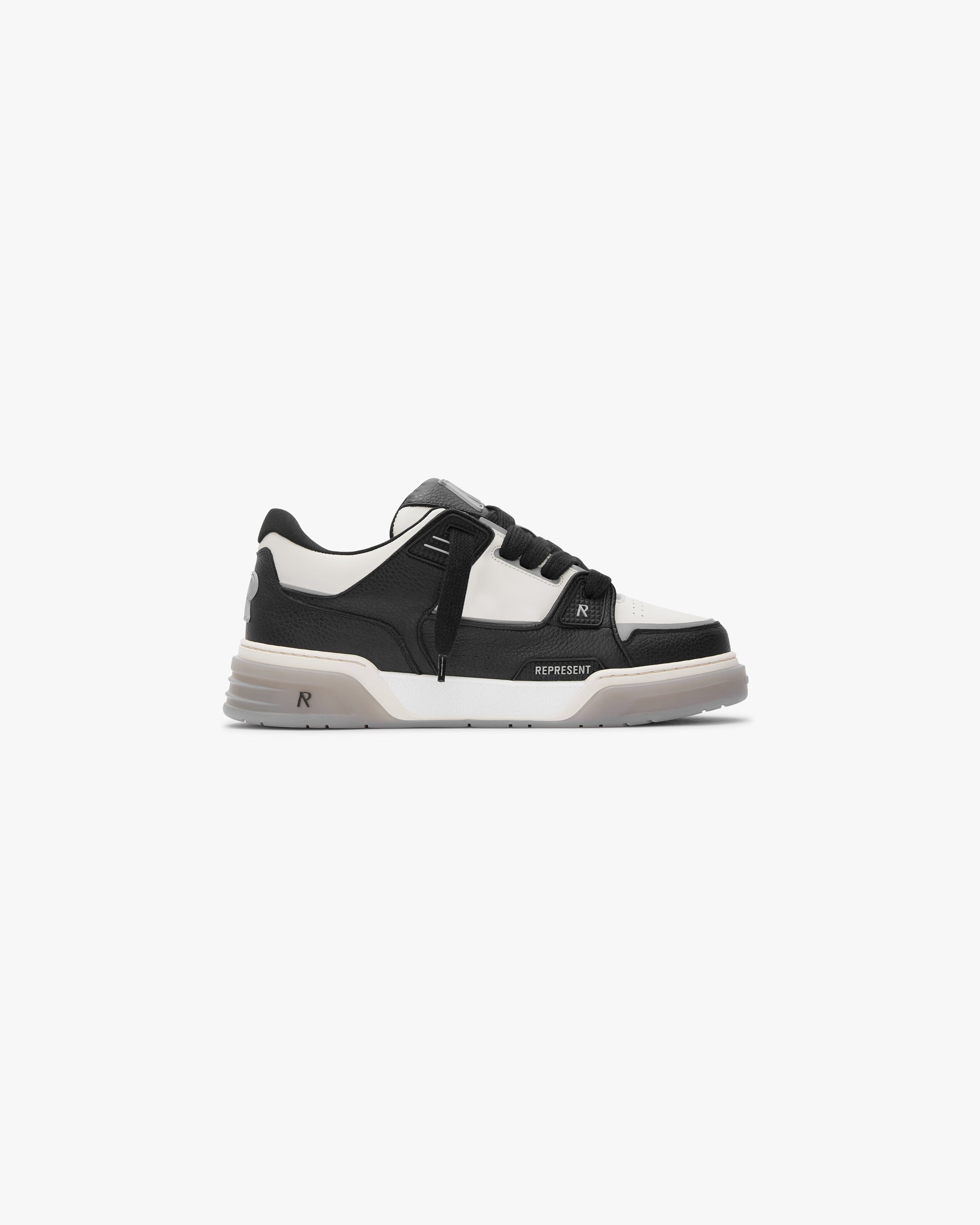 Front product image of a mens black and white shoe on a plain white background | Studio Sneaker in Black Vintage White | Stylish sneaker | SS24 Footwear | Represent Clo
