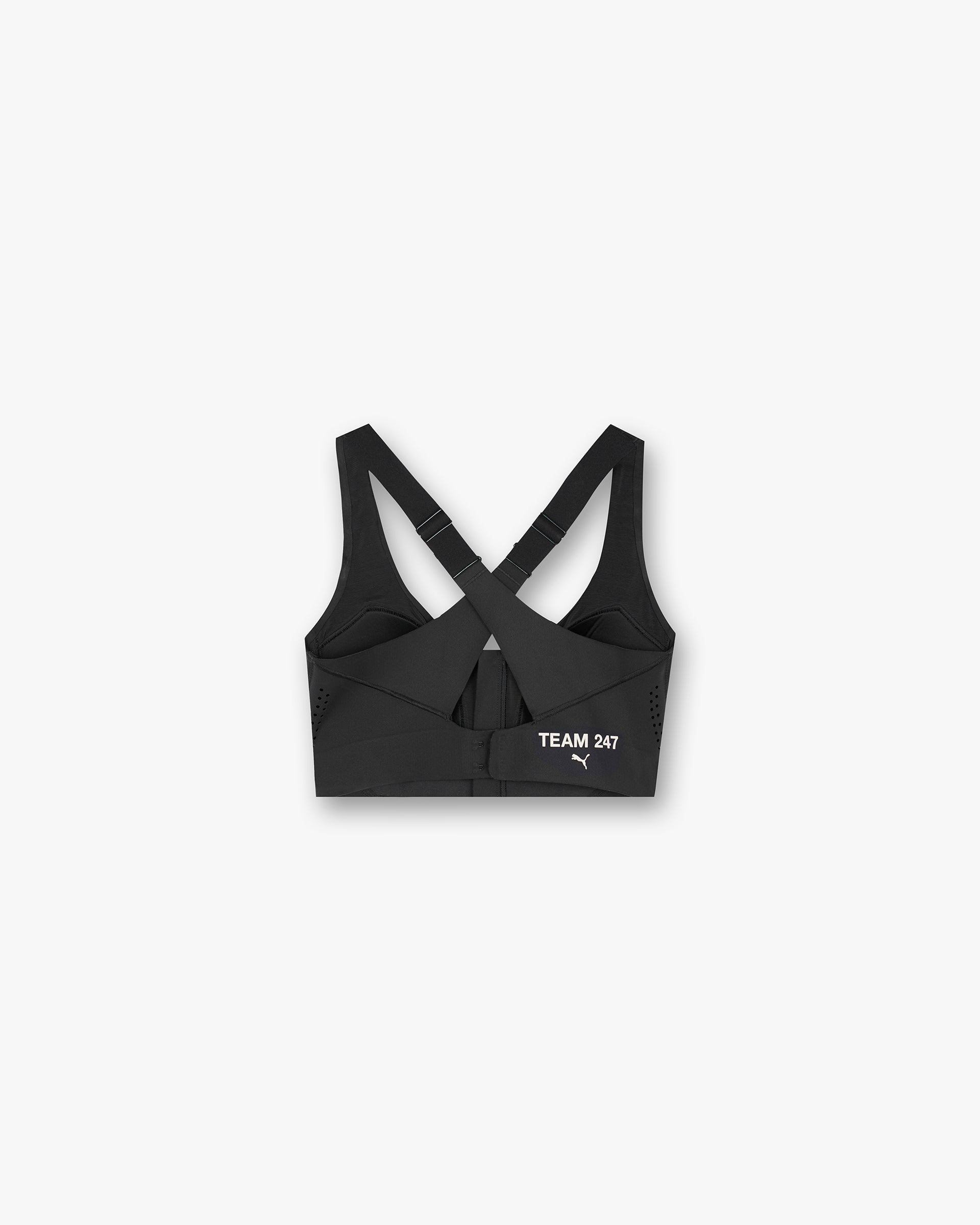 Back product image of a womens black sports bra on a plain white background | 247 X Puma Women's Shapeluxe Sports Bra in Black | Sports bra with bonded seams and adjustable straps | 247 T-Shirts | Represent Clo