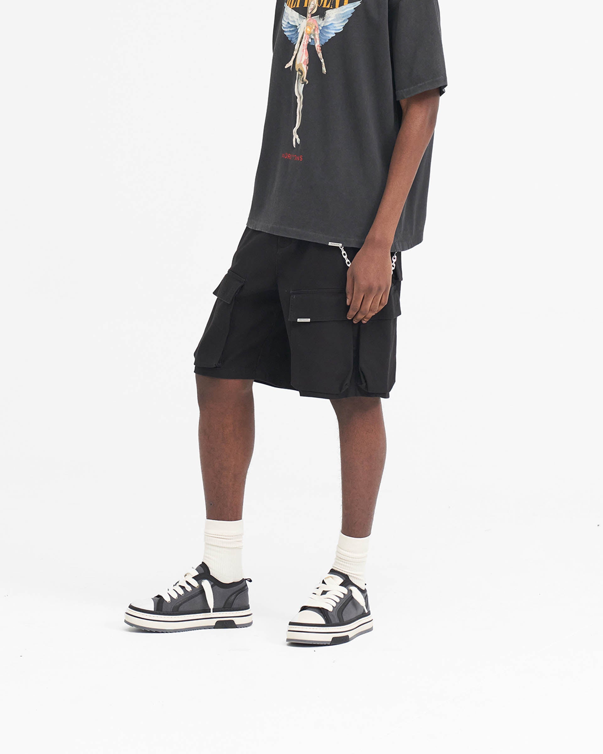 Back product image of mens black cargo shorts on a plain white background | Baggy Cotton Cargo Short in Black | Baggy fit with oversized 3D pockets | SS24 Shorts | Represent Clo