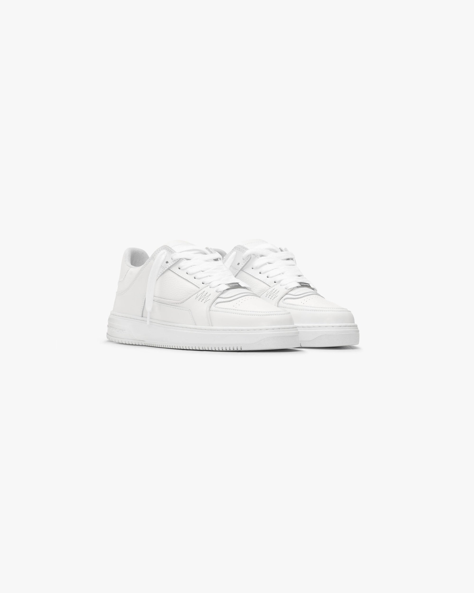 Back product image of a mens white trainer on a plain white background | Apex in Flat White | Low top trainers with leather and suede uppers | Flow Footwear | Represent Clo