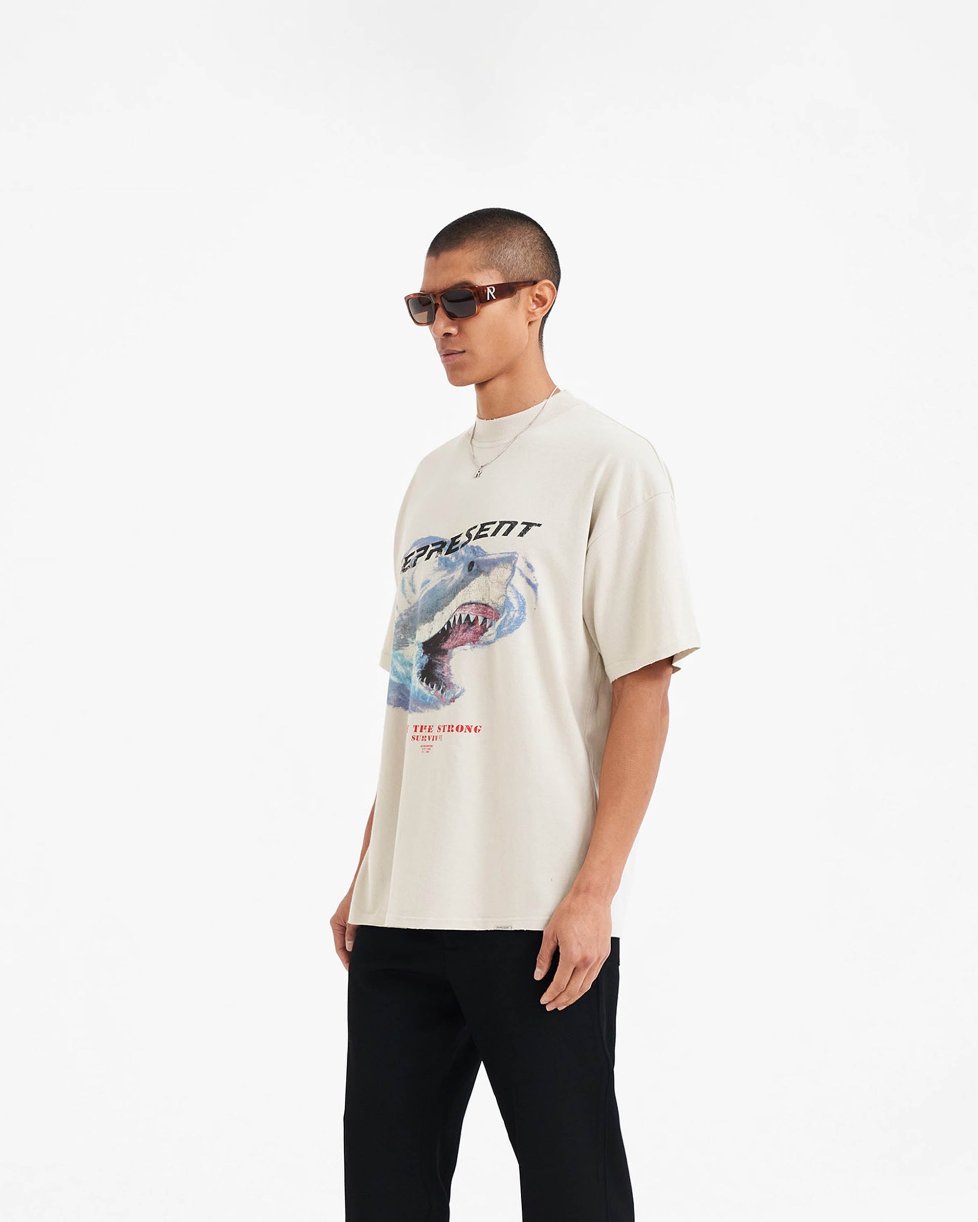 Back product image of a mens white t-shirt on a plain white background | Only The Strong Survive T-shirt in Vintage White | Oversized t-shirt with hand-distressed detailing | SUMMER CAPSULE T-Shirts | Represent Clo