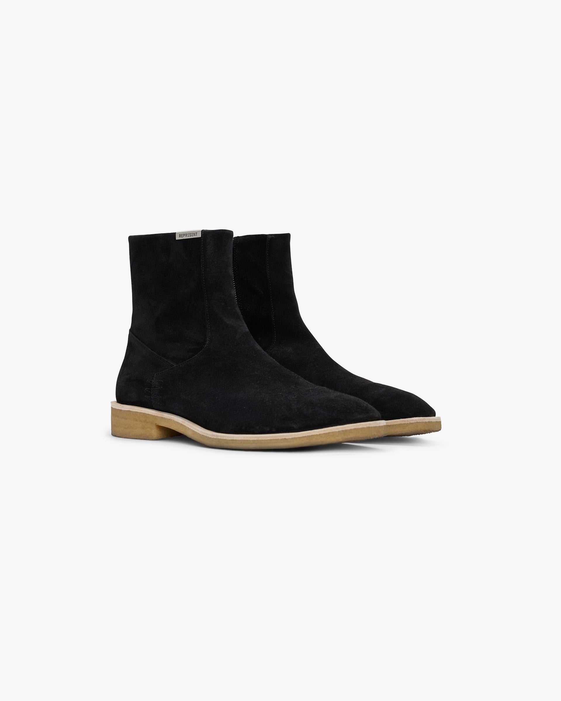 Back product image of a mens black Chelsea boot on a plain white background | Crepe Chelsea Boot in Black | Soft suede upper with signature zig zag stitching | SS25 Footwear | Represent Clo