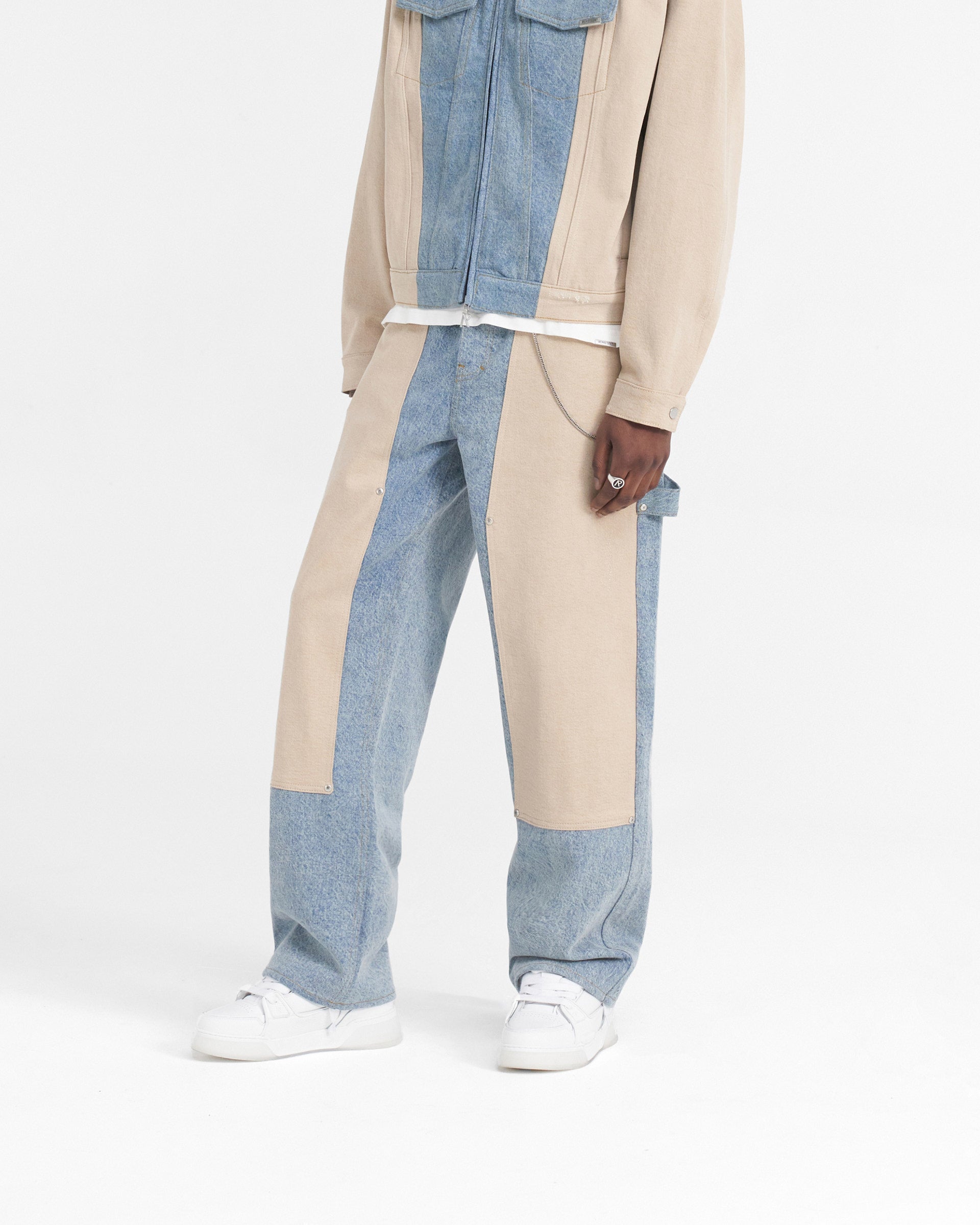 Back product image of mens blue denim on a plain white background | R3C-V2 Colour Block Carpenter Denim in Blue | Carpenter denim with dirt cashmere panelling | SS24 Denim | Represent Clo
