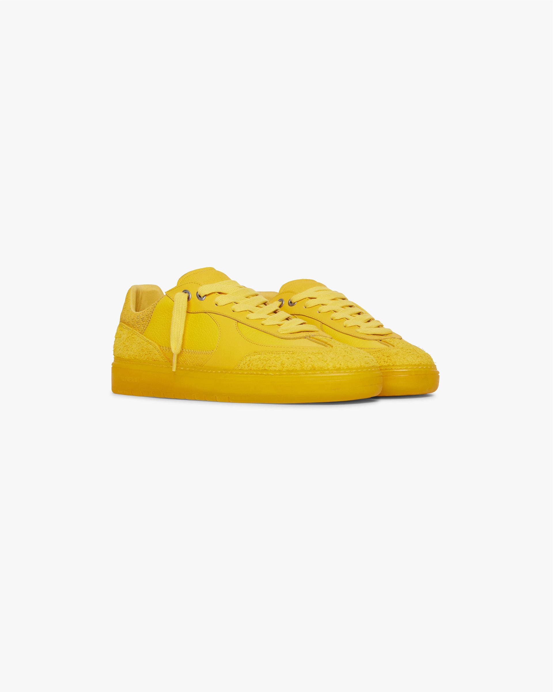 Back product image of a mens yellow sneaker on a plain white background | Virtus in Yellow | Low profile leather and suede sneakers with initial debossed details | SS24 Footwear | Represent Clo