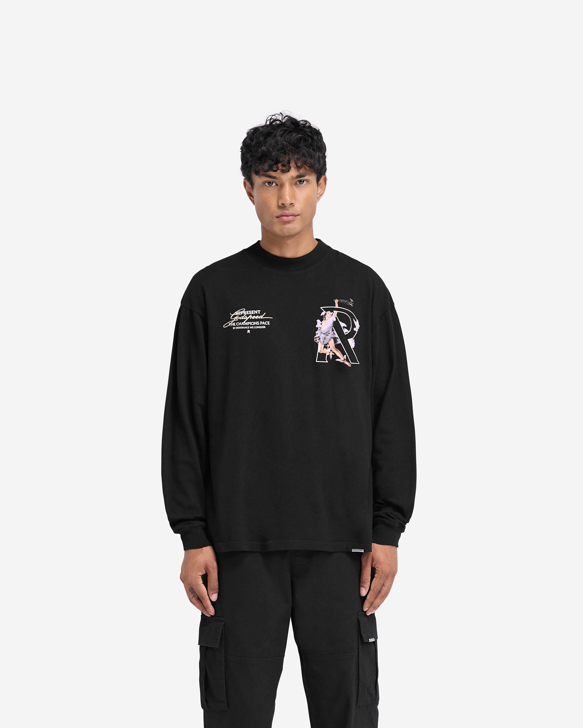 Man wearing a black long sleeve t-shirt on a plain white background | Hermes Long Sleeve T-Shirt in Jet Black | Slightly oversized tee with high density screen print | FW24 T-Shirts | Represent Clo